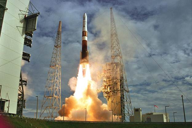 Delta 4 rocket blasting off at Kennedy Space Center