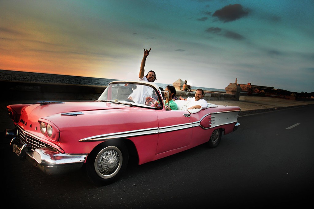 Group of males in classic car