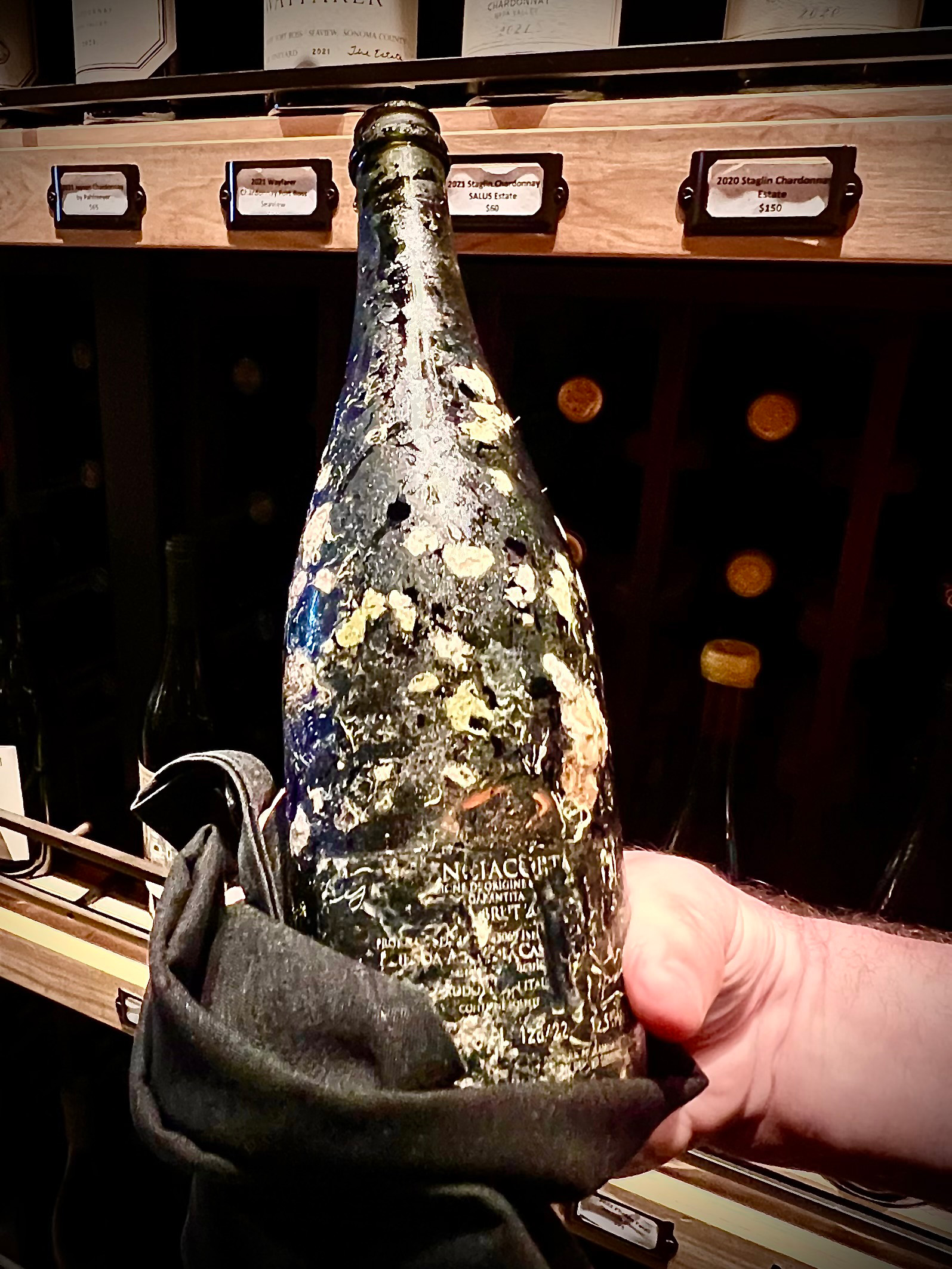 Wrapped bottle of wine