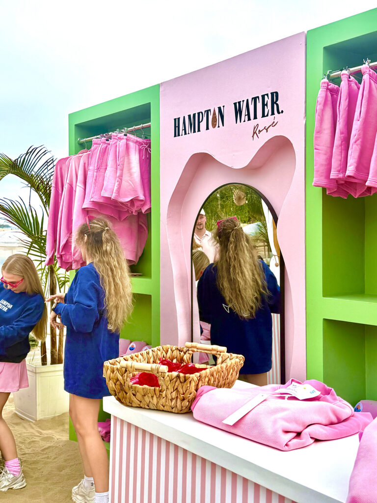 Two women around the Hampton Water rose Gift Shop
