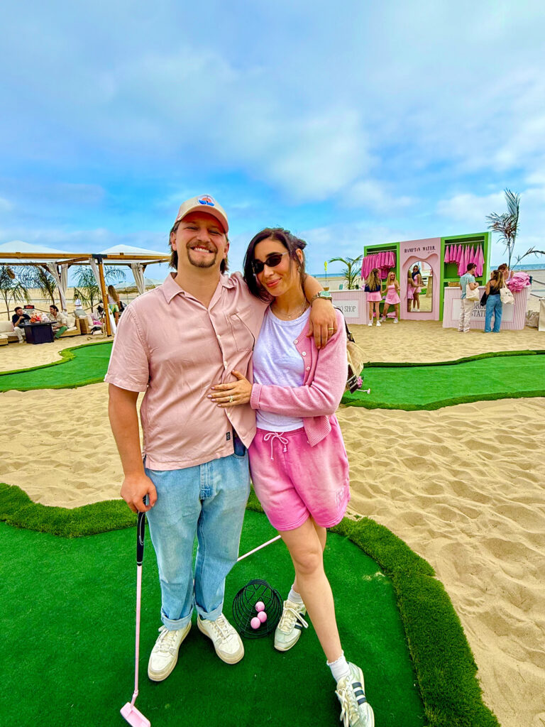 Couple playing Putt-Putt golf