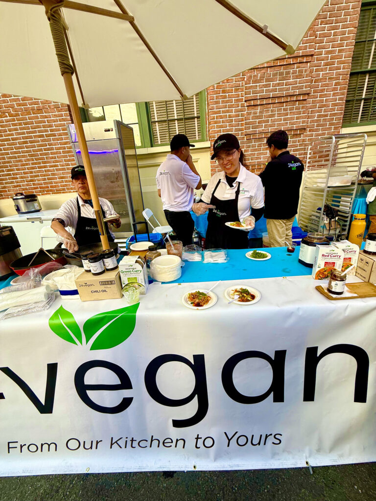24 Vegan preparing Asian dishes at Concern Foundation Block Party